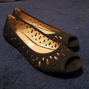 Peep toe flats.